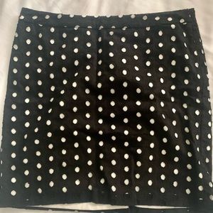 BLACK AND WHITE POLKA DOT MINI SKIRT